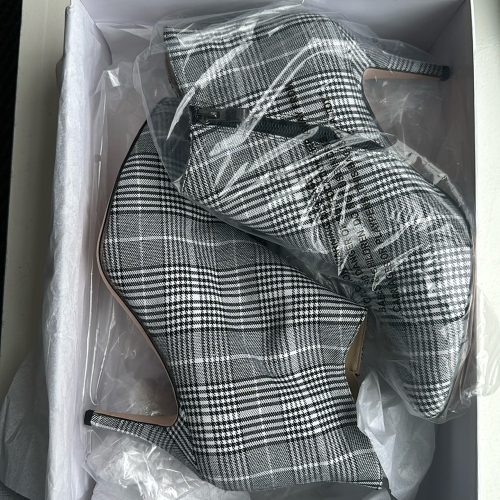 Brand new/still in box. Neiman Marcus bootie. Perfect condition.
